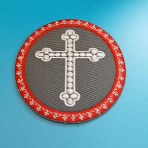 Embroidered iron on cross patch